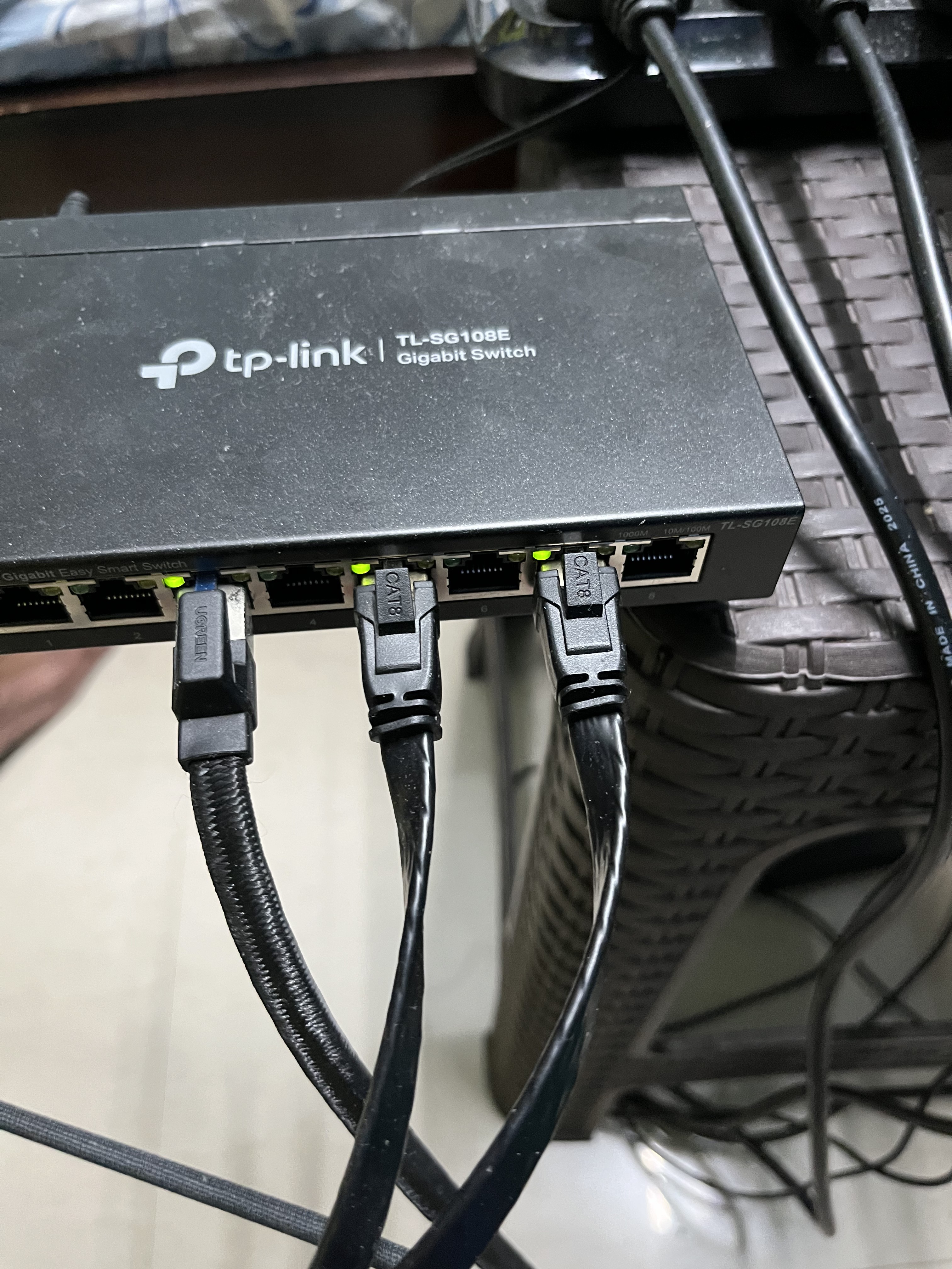 TP-Link TL-SG108E switch connected to the three Orin Nanos